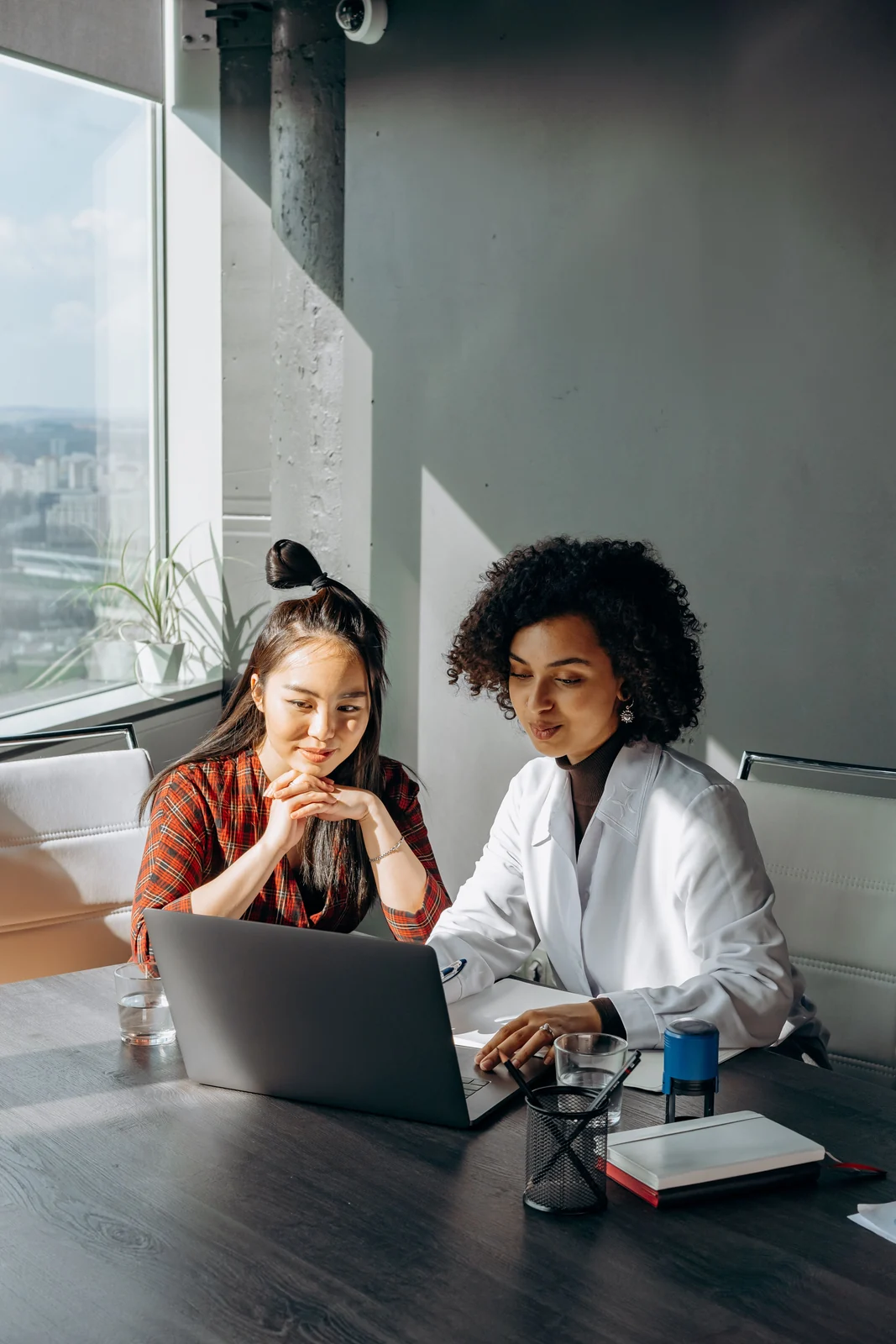 HealthHub medical professional consulting with a client